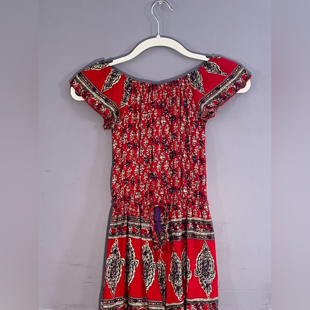 Reverse Size Xs Patterned Double Lined Romper - image 1